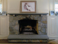 This elegant grey fieldstone fireplace was constructed for a client in New Canaan, CT. Note the fieldstone lintels as a decorative element and the 3” bluestone mantle and hearth. 