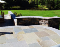 A detail of the previous sitting wall and bluestone terrace. 