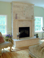 Mexican Travertine fireplace and hearth in South Salem, NY.