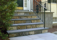 The front entry steps at this home in North Stamford were falling down. We rebuilt the old cement steps, replacing them with rock faced bluestone treads and fieldstone risers. These steps are built to last and add significantly to the curb appeal of this home.