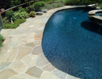This lovely pool in Westport, CT was constructed with irregular-shaped Pennsylvania bluestone in a mosaic pattern.